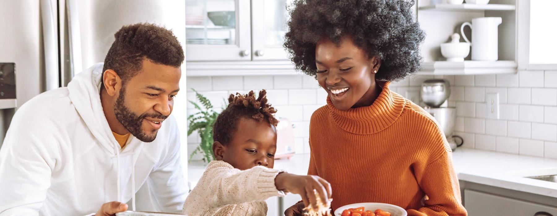 a family cooking together
